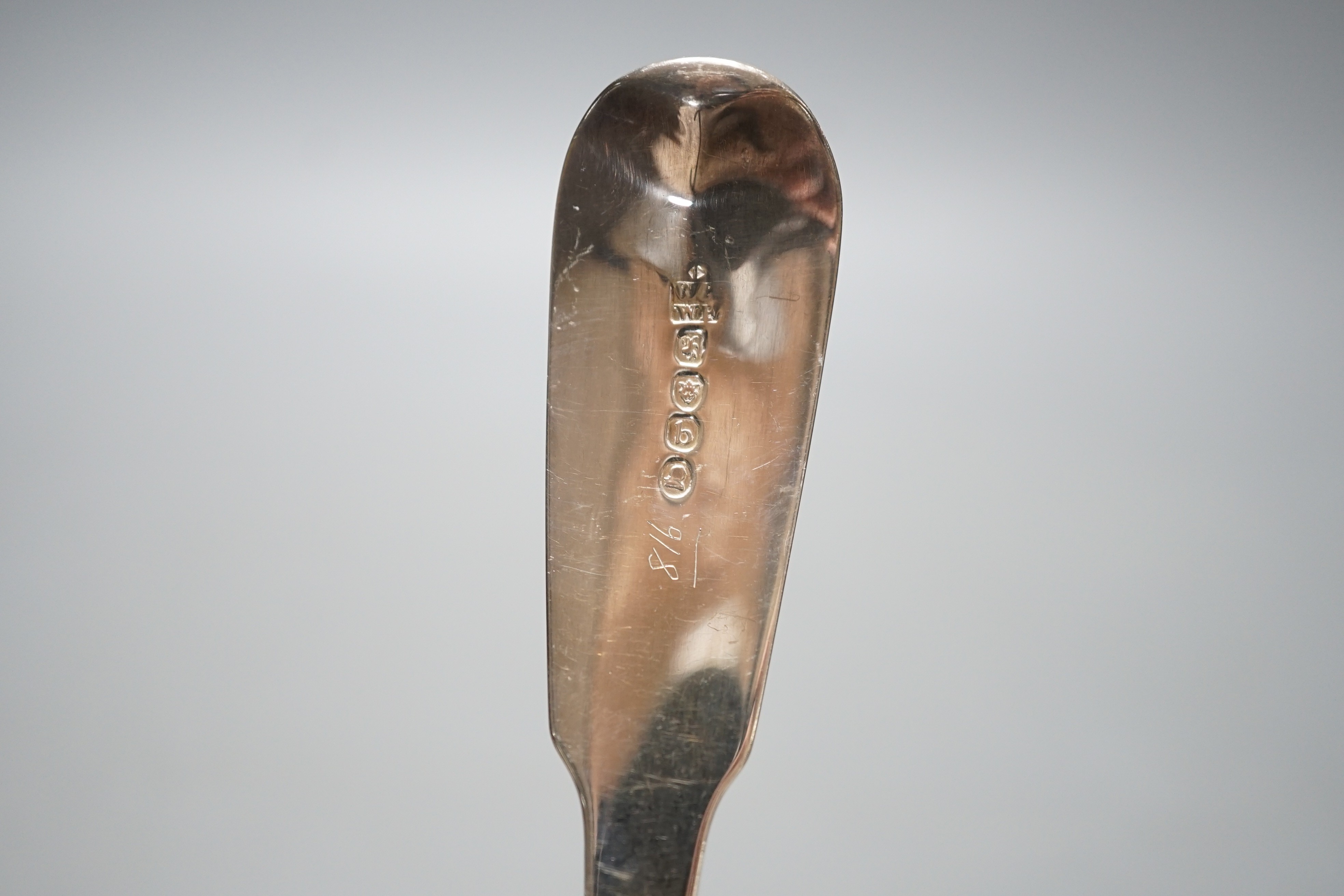 A late George III silver fiddle pattern embossed 'berry' basting spoon, Eley & Fearn, London, 1817, 30.6cm, 113 grams.